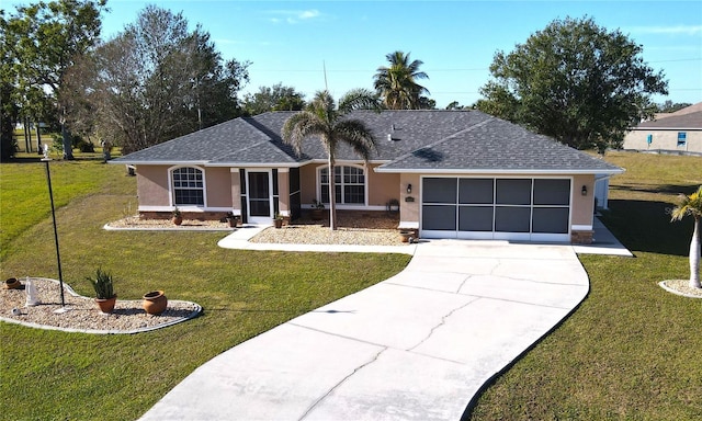 ranch-style house with a garage and a front lawn