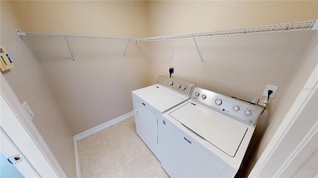 laundry room featuring independent washer and dryer