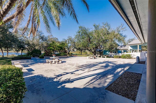 view of property's community with a patio