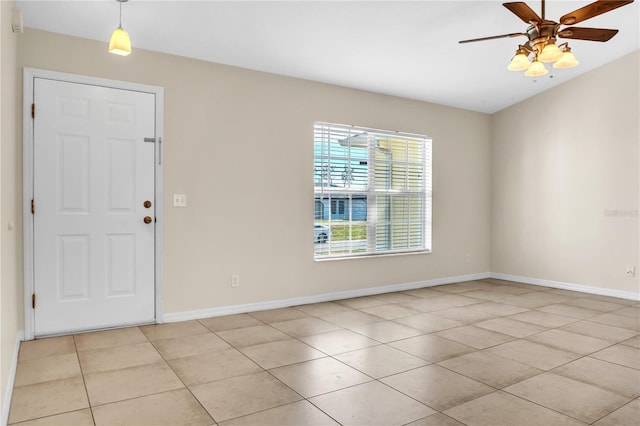 entrance foyer with light tile patterned floors and ceiling fan