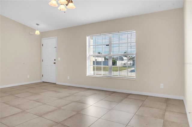 unfurnished room with light tile patterned floors