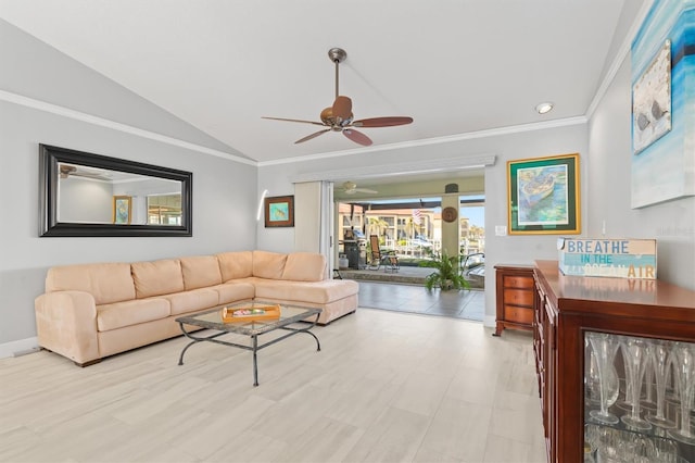 living room featuring crown molding, vaulted ceiling, and ceiling fan