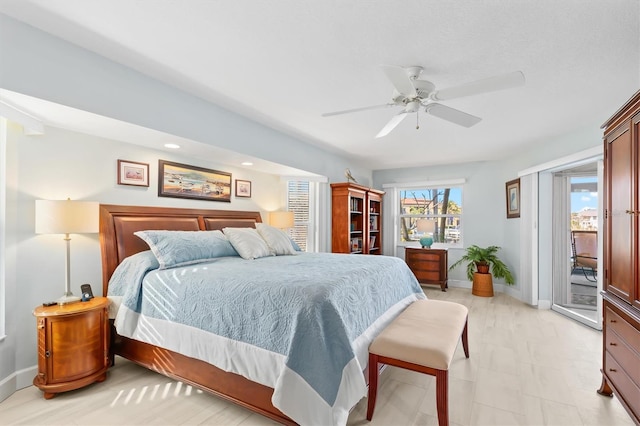 bedroom with ceiling fan and access to outside