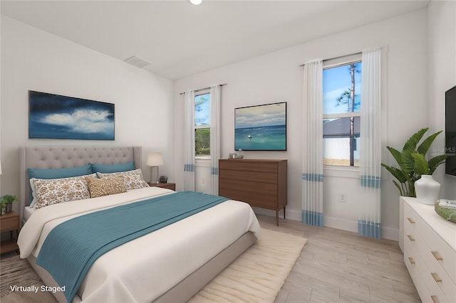 bedroom with light wood-type flooring