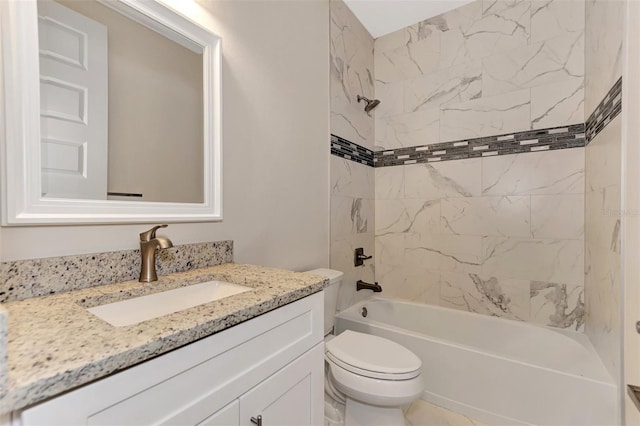 full bathroom with tiled shower / bath combo, vanity, and toilet