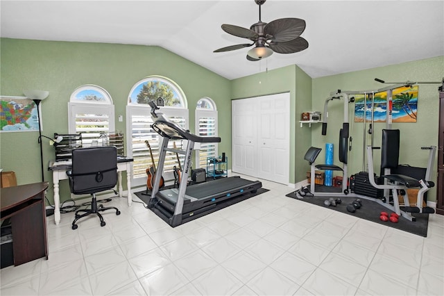 exercise room featuring vaulted ceiling and ceiling fan