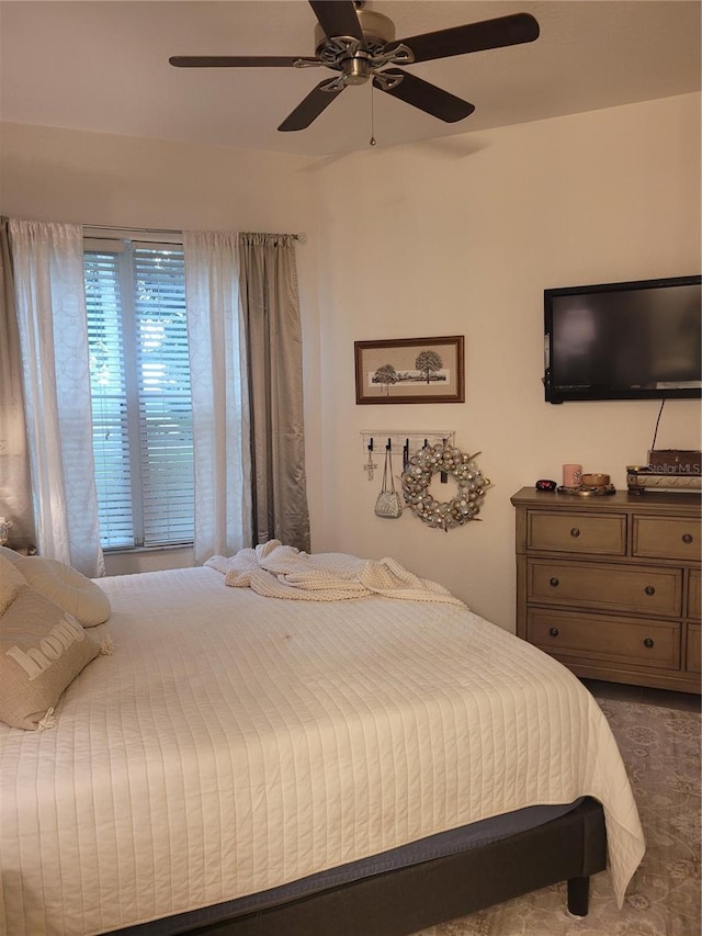 bedroom featuring ceiling fan