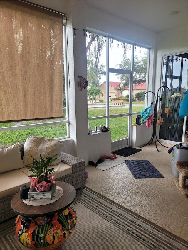 sunroom / solarium featuring a wealth of natural light