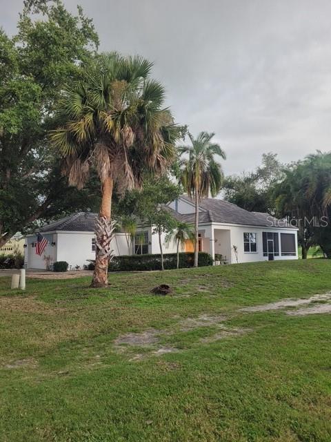 exterior space featuring a front yard