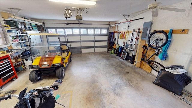 garage featuring a garage door opener and electric panel