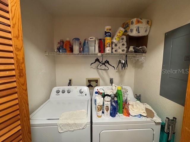 laundry room with washer and dryer