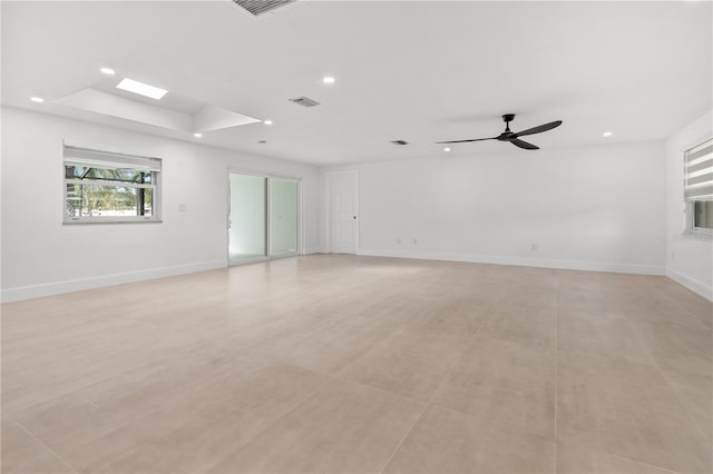 empty room featuring a ceiling fan, recessed lighting, visible vents, and baseboards