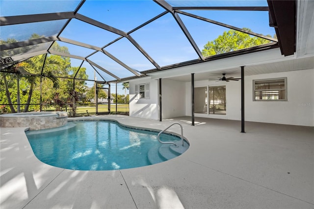 view of swimming pool with a pool with connected hot tub, a lanai, a patio, and ceiling fan