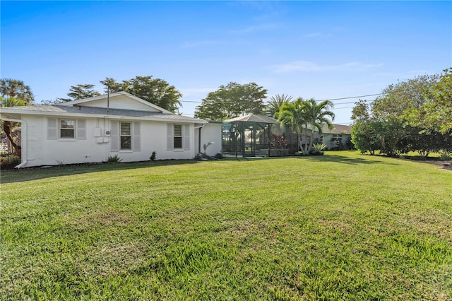 exterior space featuring a front yard and a gazebo