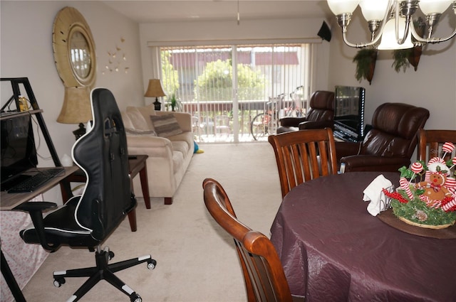 dining space with an inviting chandelier and carpet