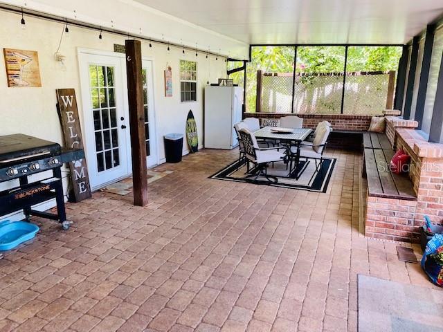 sunroom featuring a wealth of natural light