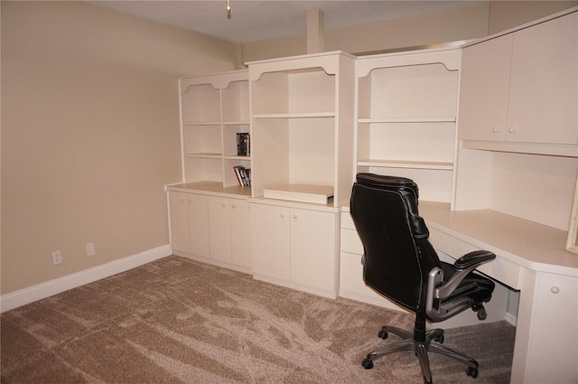 unfurnished office with carpet flooring