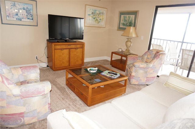 living room featuring light colored carpet