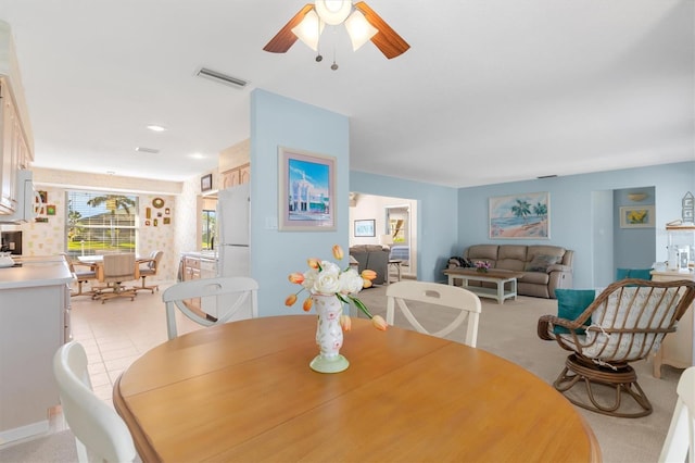 dining area with ceiling fan