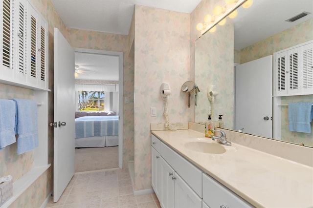 bathroom featuring vanity and tile patterned flooring