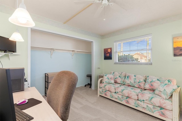 carpeted office with ceiling fan