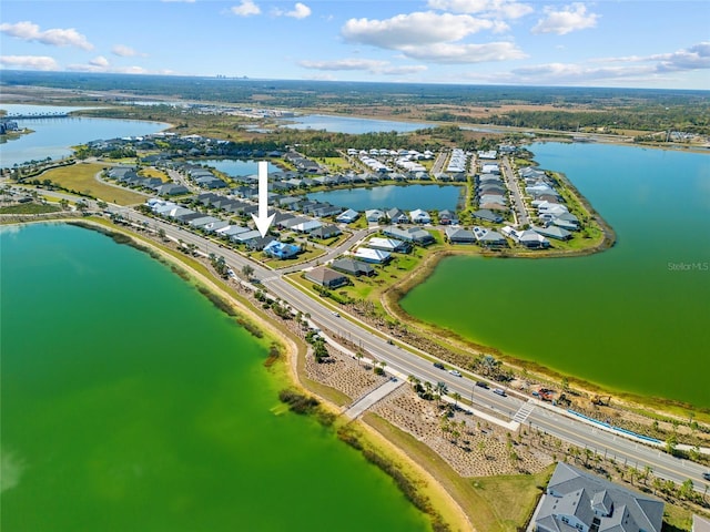 bird's eye view with a water view