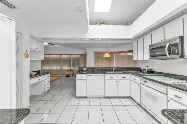 kitchen with white cabinetry, sink, white appliances, and pendant lighting