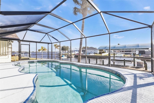 view of swimming pool with a water view, a lanai, a patio, and a boat dock