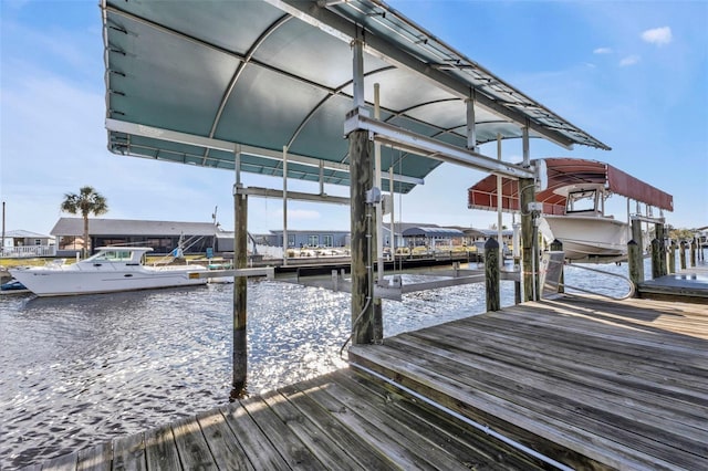 view of dock with a water view