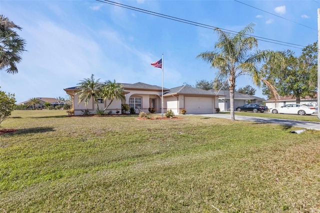 ranch-style house featuring a garage and a front yard