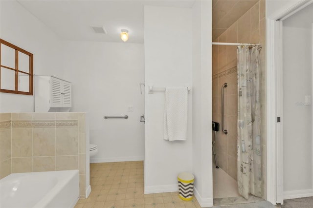 bathroom with shower with separate bathtub and toilet