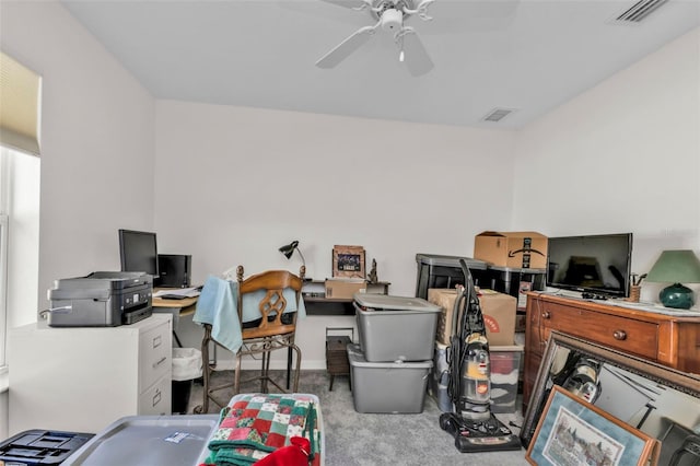 home office with ceiling fan and light colored carpet