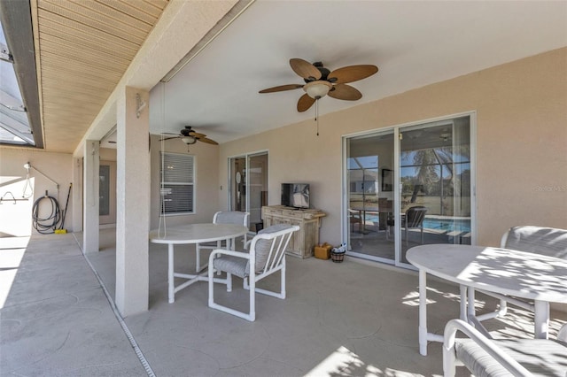 view of patio / terrace featuring ceiling fan