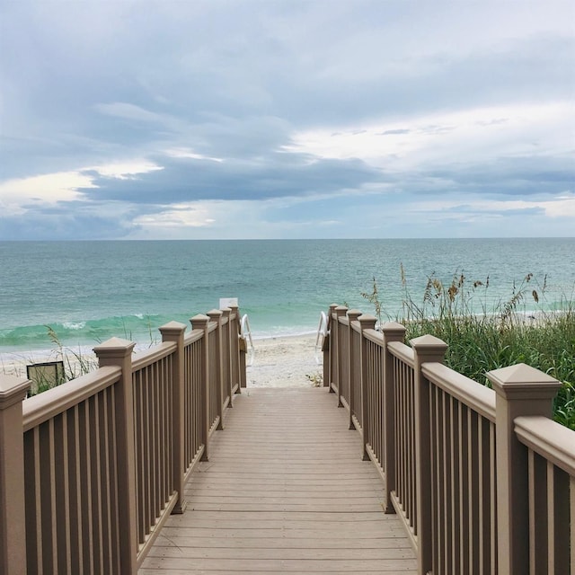 property view of water featuring a beach view