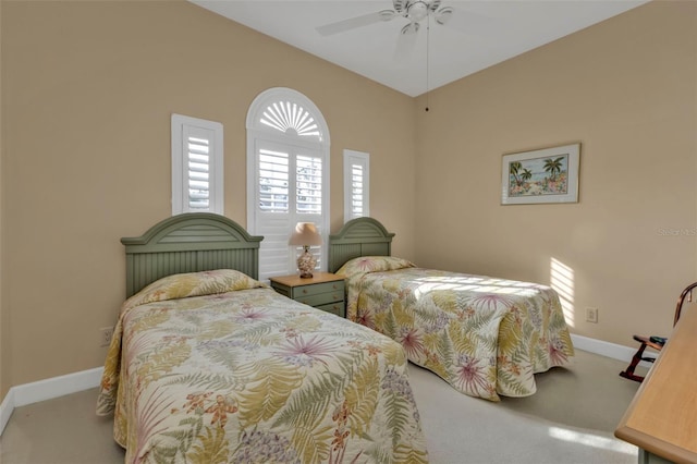 bedroom featuring ceiling fan and carpet flooring