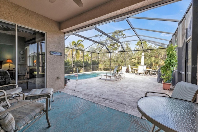 view of patio / terrace featuring a lanai