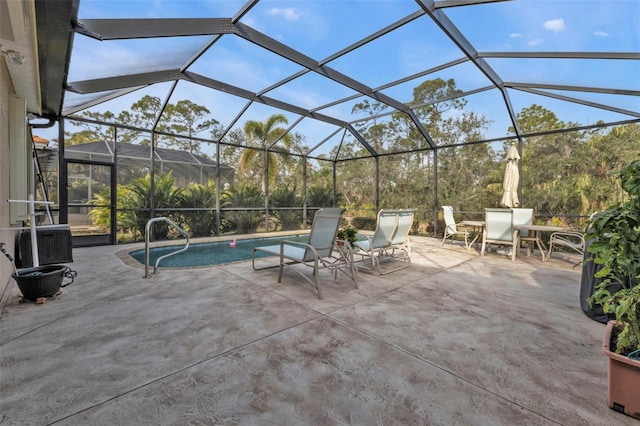 view of patio / terrace with a lanai