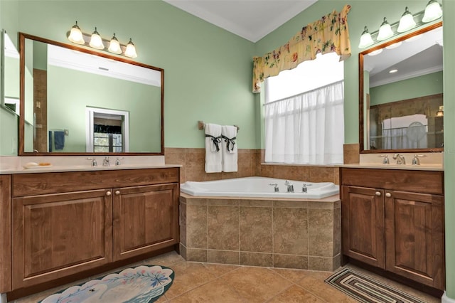 bathroom featuring tile patterned flooring, vanity, a relaxing tiled tub, and crown molding