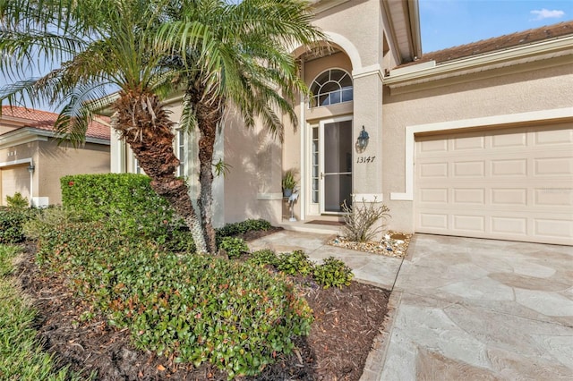 entrance to property with a garage