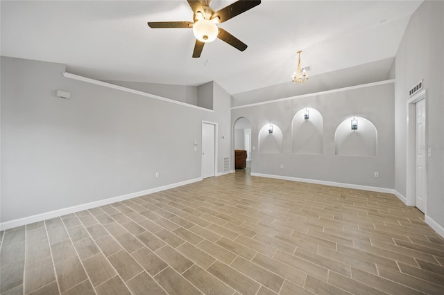 interior space featuring high vaulted ceiling, ceiling fan with notable chandelier, and light wood-type flooring