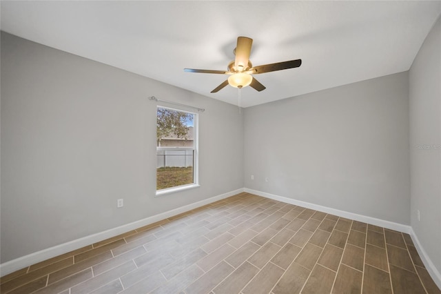 unfurnished room with ceiling fan