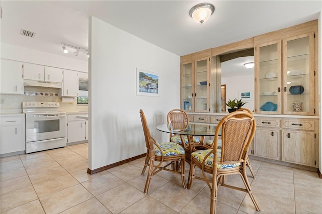 view of tiled dining area