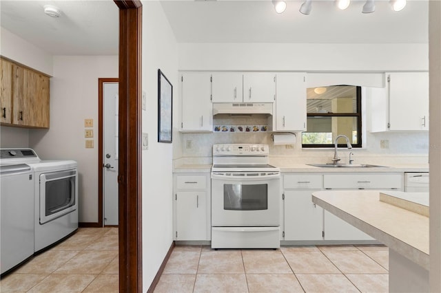 kitchen with white electric range, separate washer and dryer, sink, and white cabinets