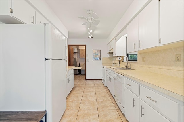 kitchen with sink, light tile patterned floors, white appliances, decorative backsplash, and white cabinets