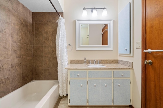 bathroom featuring shower / bath combo, tile patterned floors, and vanity