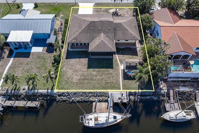 drone / aerial view featuring a water view