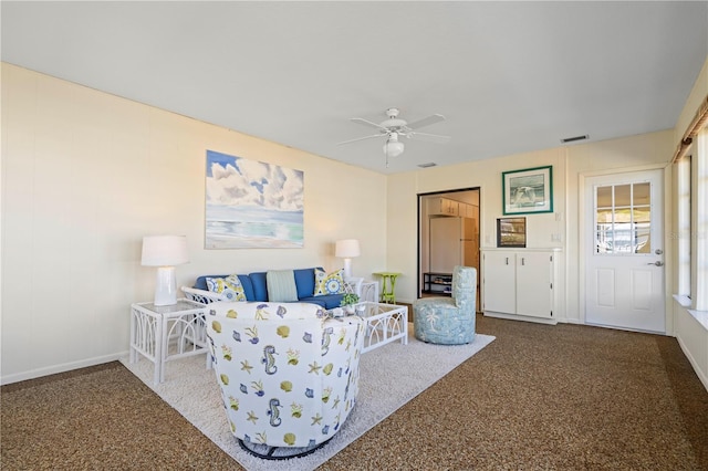 520 Boardman Dr, Punta Gorda, FL 33950 - living room featuring baseboards, a ceiling fan, visible vents, and carpet
