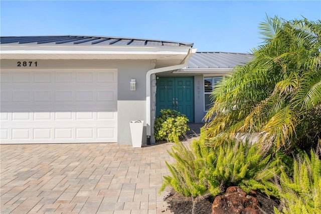 property entrance with a garage