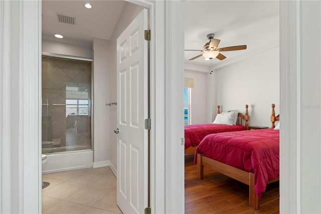 bedroom featuring ceiling fan and light tile patterned floors