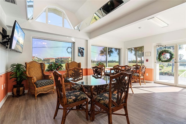 dining area with hardwood / wood-style flooring